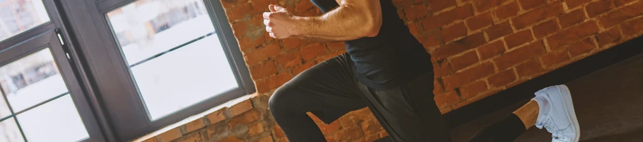 A person doing lower body workouts at a gym