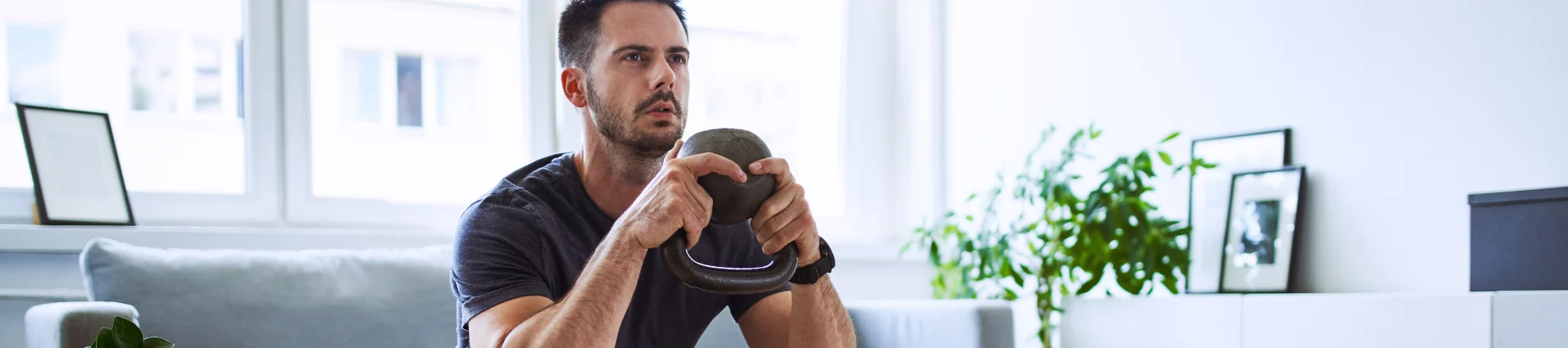 Person doing HIIT Kettlebell workouts