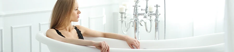 A woman inside the bath tub