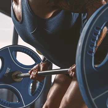 A person doing arm workouts at the gym