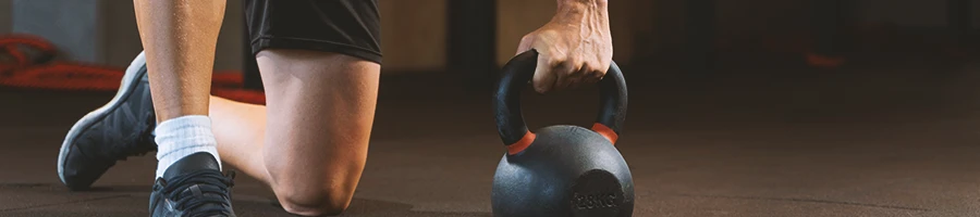 A person doing kettlebell workouts