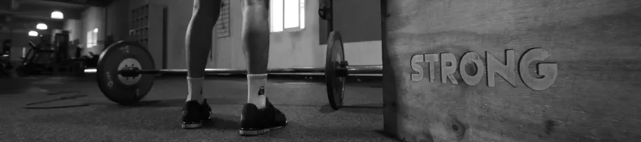 Person next to barbell