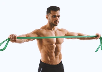 A muscular man holding a resistance band