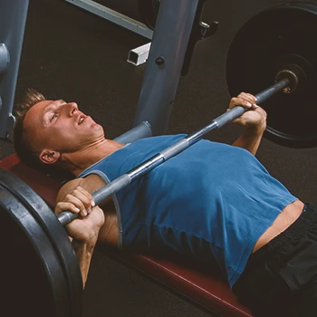 A person doing incline chest press workouts