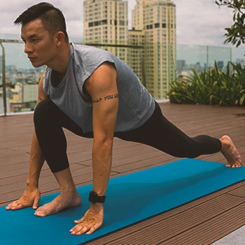 A person at the park stretching in the morning