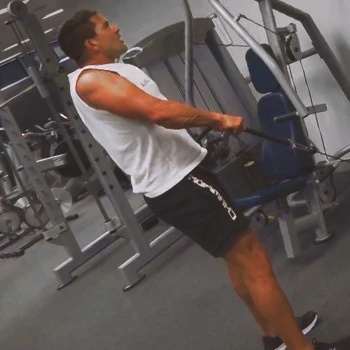 A person doing Cable Shrugs