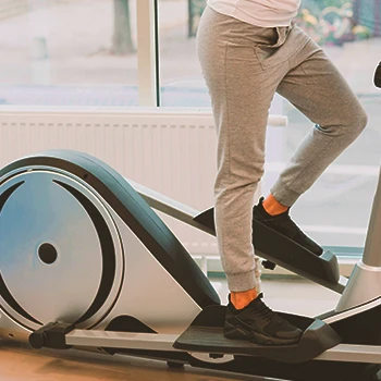 A person working out on an elliptical machine