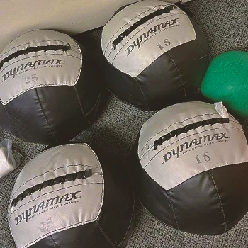 Close up shot of medicine balls on the ground