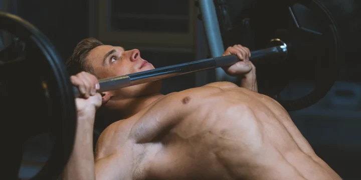 A person doing outer chest workouts at the gym