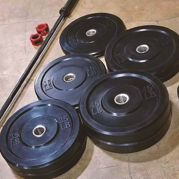 Close up shot of bumper plates and collars