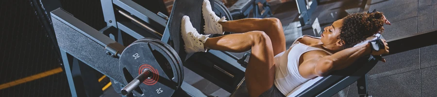 A woman at the leg press