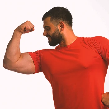 A person flexing his forearms and biceps