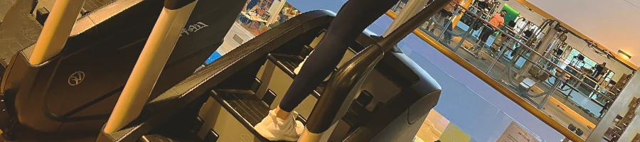 A person at the gym doing HIIT workouts at a stairmaster