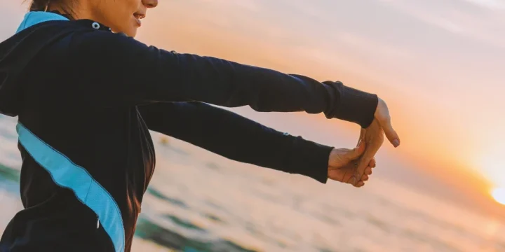 A person doing morning workouts and stretches