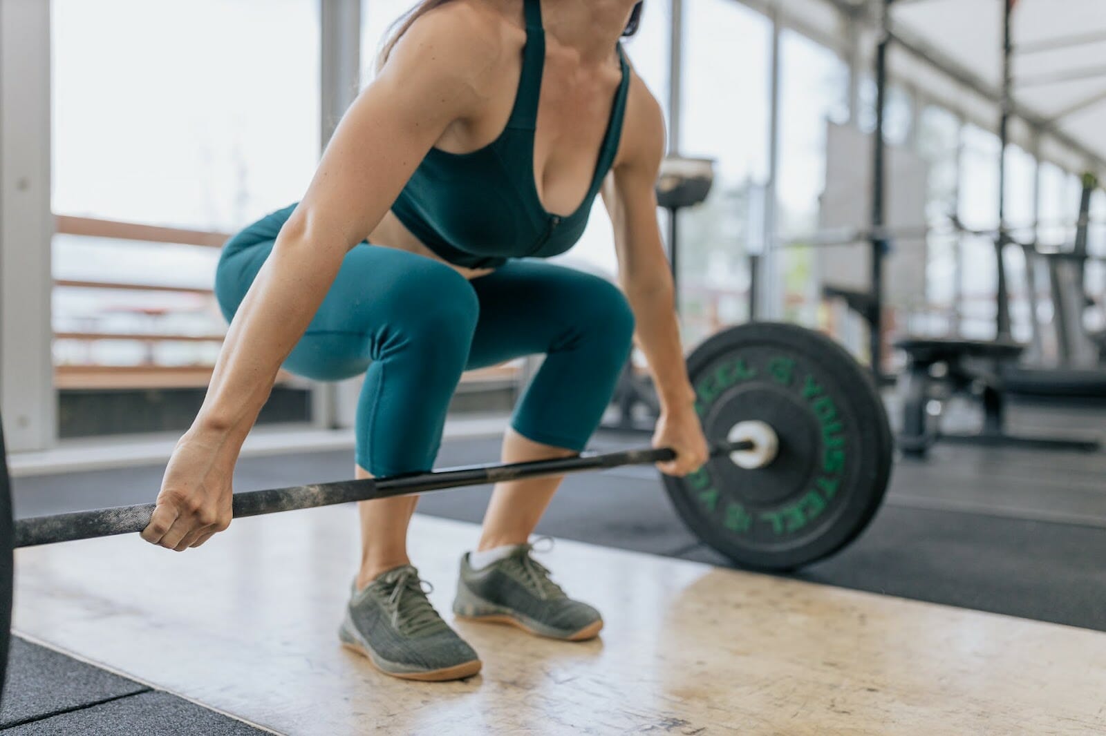 Woman about to lift weights