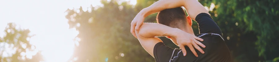 A person stretching outside