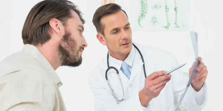 A man and his doctor discussing Testosterone replacement therapy