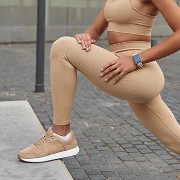 Woman doing leg workout on stairs