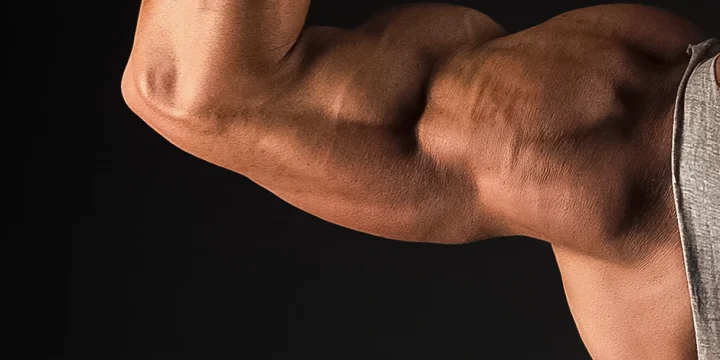 A person with muscular tricep development