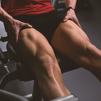 Leg shot focusing quads of man