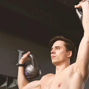 Man doing shoulder exercise in gym