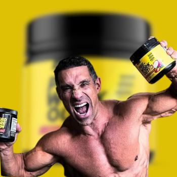 Greg Doucette holding pre-workout