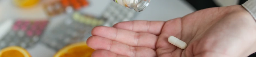 A supplement placed on a hand