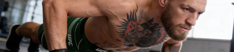 Conor doing a push up workout