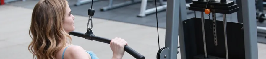 Zoey doing a lat pulldown exercise