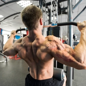 A man doing lat pulldown