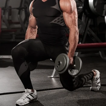 A man doing walking lunges