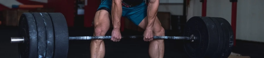 A man lifting weights at the gym