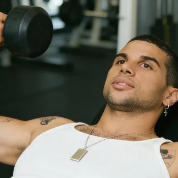 Mason doing a dumbbell bench press