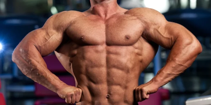 A man flexing his toned body