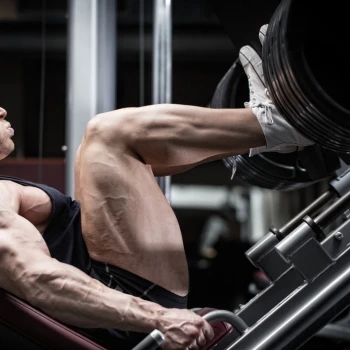 A man doing his workout routine in the gym