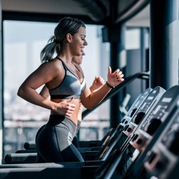 A woman running on treadmill