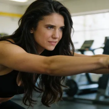 Nina doing a yoga exercise in the gym