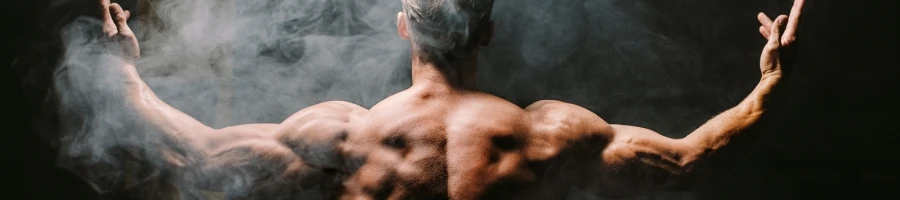 A man flexing his back muscles