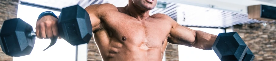 A man working out using dumbbells