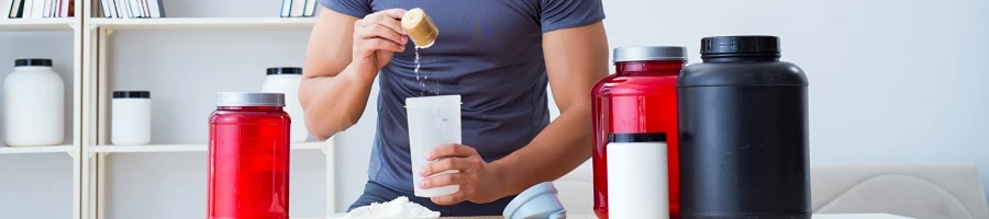 A man making his protein drink