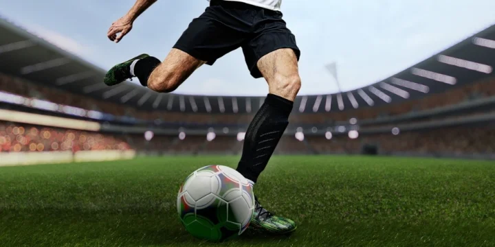 A guy playing soccer like Lionel Messi