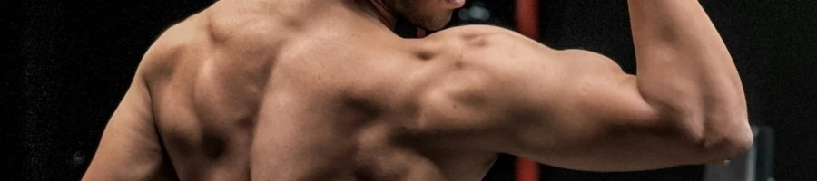 A man showing off his muscle gains