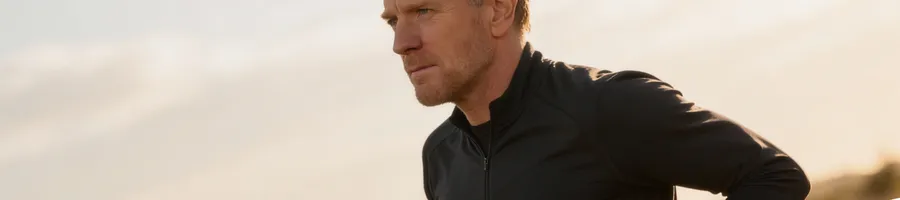Ewan McGregor jogging outdoors.