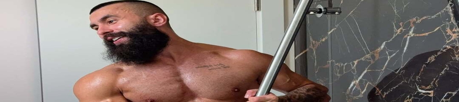 a muscular guy holding a mop