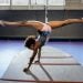 A sexy female gymnast doing her routine