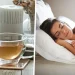 A drink in a glass mug and a woman sleeping